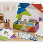 The Play Therapy Box is open on a table, showing a printed manual, cards, tools, a QR code, and a simple follow-up form, appearing as a “training system” rather than a single game.